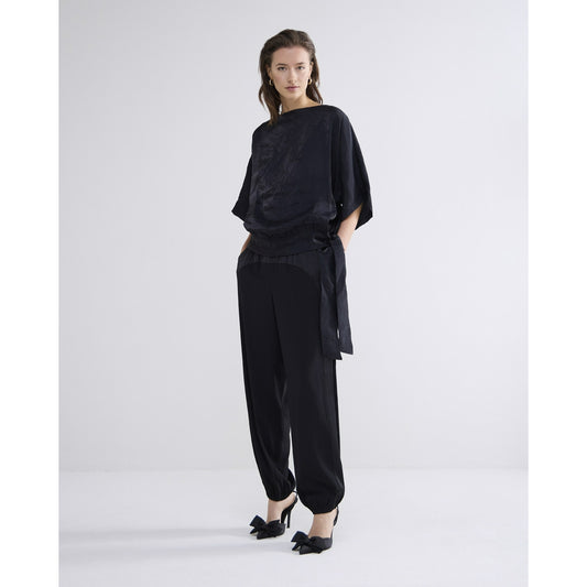 Summum-black-batwing-slouchy-top-top-with-bow-model-front-view