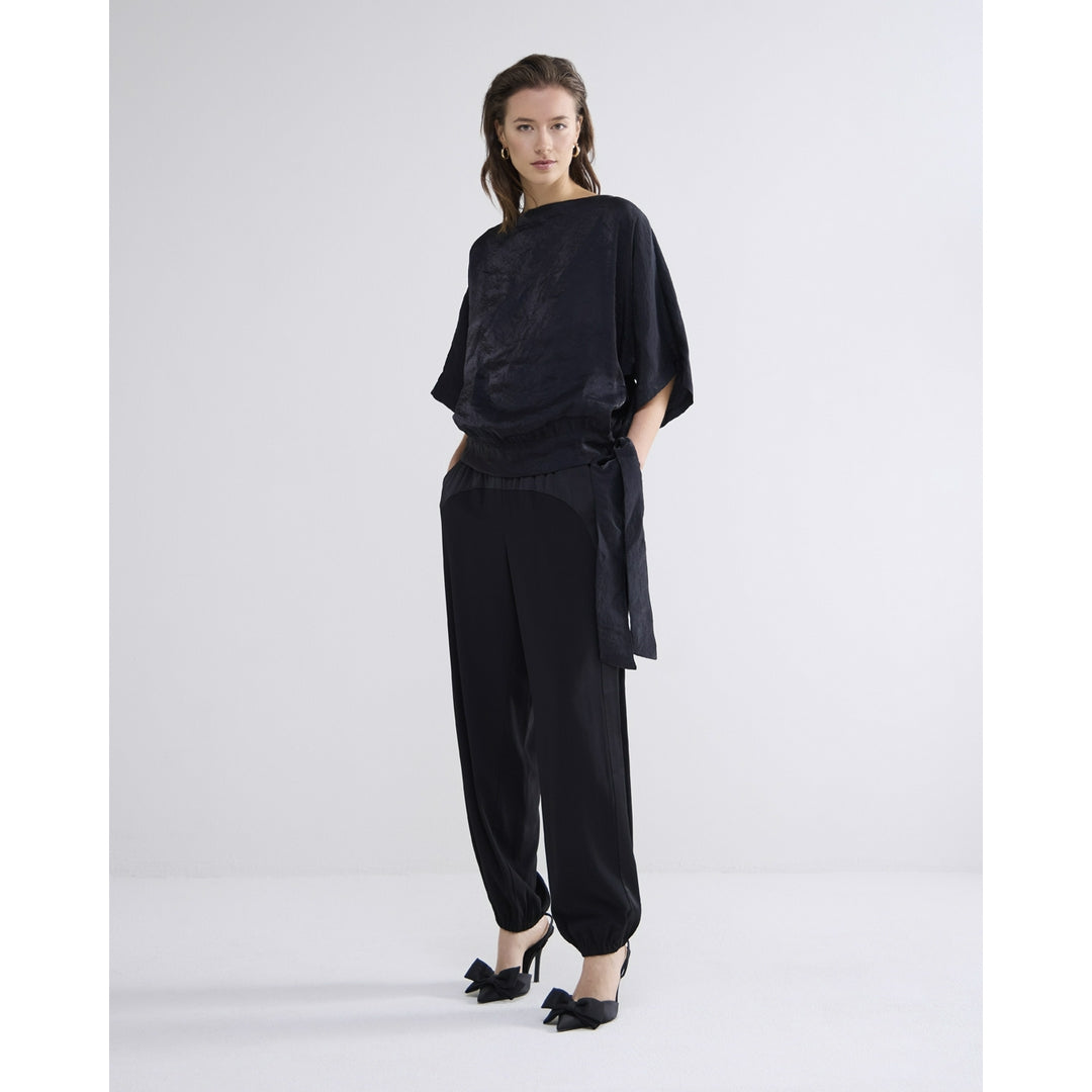 Summum-black-batwing-slouchy-top-top-with-bow-model-front-view